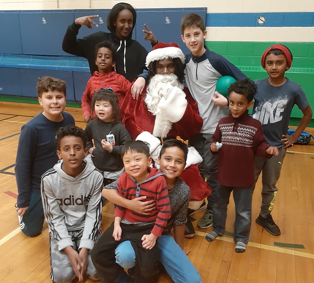 A group of children with Santa Clause